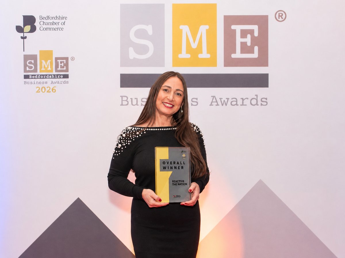Michelle Crook, founder of Reactiv8, with the SME Bedfordshire Business Awards 2026 Overall Winner trophy